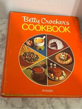 Vintage 1976 Betty Crocker Cookbook with Bright Orange Cover and Yellow Text